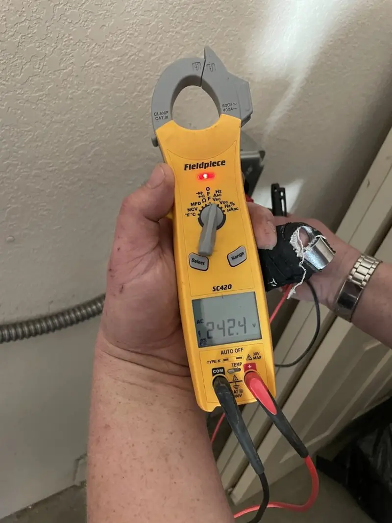 Voltage testing with clamp meter during Aluminum Wiring Replacement in Asheboro